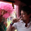 James Whewell, one of the main organisers of the Secret Garden Party, enjoying a much-needed break and a great view in our pink limo - with champers of course. Taken for Guerilla Science, July 24 2009.