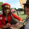 Two lovely girls at the Paradise Gardens day music festival in London, receiving some sweet science facts swaddled around sweets inside silken bags. Taken for Guerilla Science, June 20 2009.
