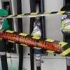 Defaced pumps at a British Petroleum gas station after a demonstration by climate activists in London, England. Published with SolveClimate, April 15 2010.