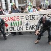 Protesters outside the Canadian High Commission in London, England, campaigning against mining and oil extraction in the Alberta tar sands. Published in This Magazine, September 28 2009.