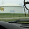 The view from the road next to Ada Lockridge's home - vats of naptha belonging to Suncor. Published in Corporate Knights, November 30, 2005.