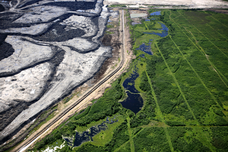 Before - and after. Photo Credit: Jiri Rezac, Courtesy of Greenpeace.