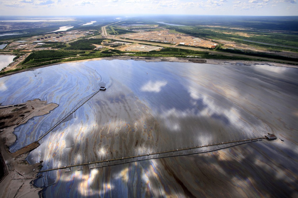 A tailings pond created by a Syncrude upgrader upstream of Fort Chipewyan. Photo Credit: Jiri Rezac, Courtesy of Greenpeace.